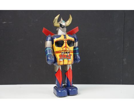Unboxed 1970s tinplate Popy Tenku Maryu Gaiking Japanese wind up walking robot figure, with marking to back and marked Made I