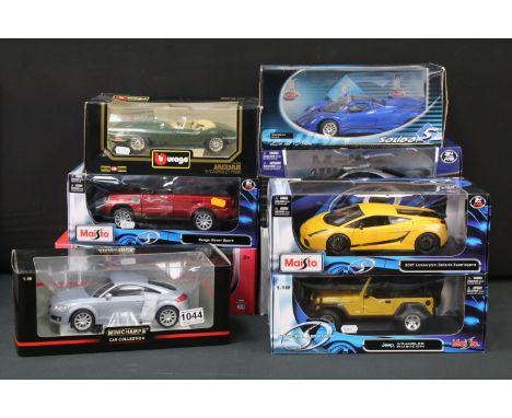 Nine boxed 1/18 scale diecast models to include Burago Jaguar E Cabriolet 1961, Maisto Premiere Edition Mercedes-Benz CLK-GTR
