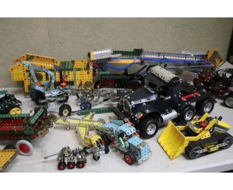 Meccano - Quantity of Mid 20th C onwards Meccano models to include 2 x John Deere Tractors (One on tracks), Truck, Clockwork 