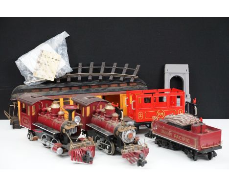 Two Bachmann G scale Union Pacific 19 locomotives, one with tender, plus a PM coach and an a/f Union Pacific coach