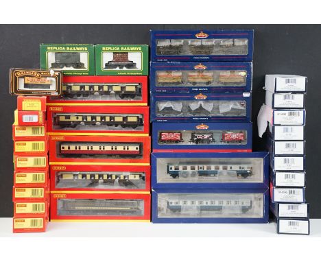33 Boxed OO gauge items of rolling stock to include 14 x Hornby, 16 x Bachmann, 2 x Replica Railways and 1 x Palitoy Mainline