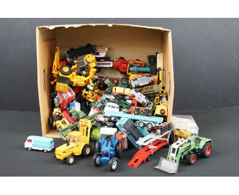 Around 75 Mid 20th C onwards play worn diecast models to include Dinky, Corgi, ERTL, Britains, Siku, etc featuring 4 x Vivid 