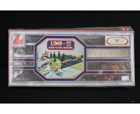 Boxed Lima OO gauge Road To Rail Terminal set (Missing track, but otherwise complete), Mainline Transformer and small quantit