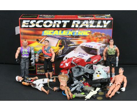 Boxed Scalextric Escort Rally set with both slot cars plus a collection of Hasbro Action Man figures, vehicles and accessorie