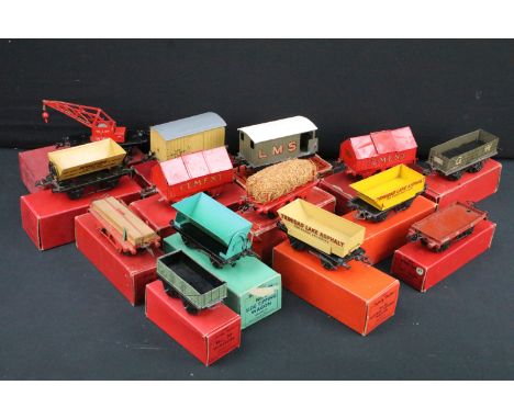 14 Boxed Hornby O gauge items of rolling stock to include Fibre Wagon, No 50 Side Tipping Wagon, No 1 Wagon, Flat Truck, No 5