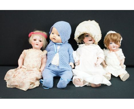 Three Ernst Heubach Koppelsdorf bisque headed dolls to include baby girl doll in white dress with headpiece, with blue eyes, 