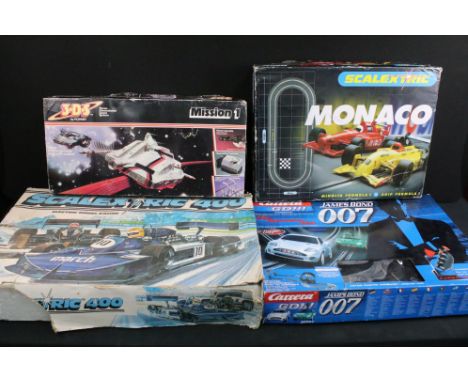 Three boxed slot car sets to include Scalextric C1046 Monaco, Carrera Go James Bond 007 40th Anniversary Die Another Day and 