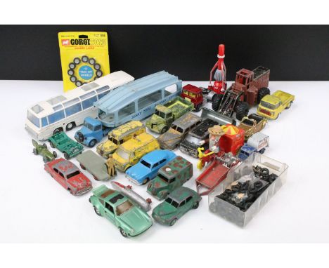 22 Mid 20th C play worn diecast models, mainly Dinky &amp; Corgi to include Dinky Vega Major Luxury Coach, Corgi Magic Rounda