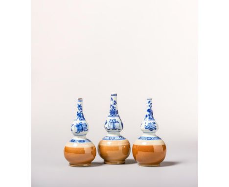 Kangxi Period (1662-1722) Decorated on the upper half and slender necks with precious objects and floral motifs in underglaze