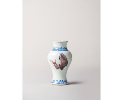 Kangxi Period (1662-1722), with an apocryphal Chenghua mark on the base. Decorated with three fish on the sides, petals encir