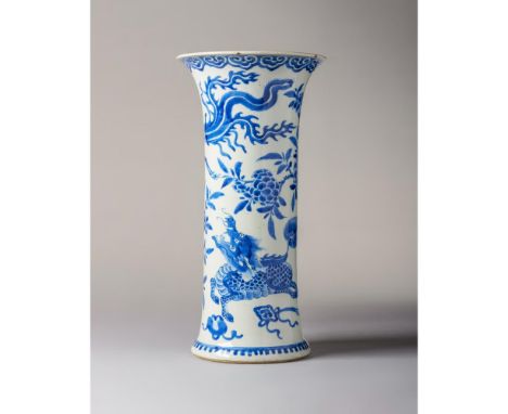 Kangxi Period (1662-1722) Boldly decorated in vibrant shades of underglaze blue, depicting qilin and phoenix among branches w