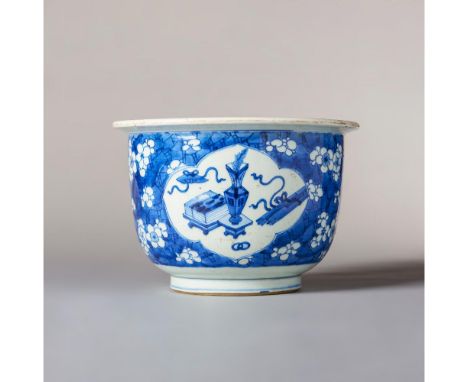 Kangxi period (1662-1722) Potted with rounded sides and decorated with large shaped panels enclosing antiques and precious ob