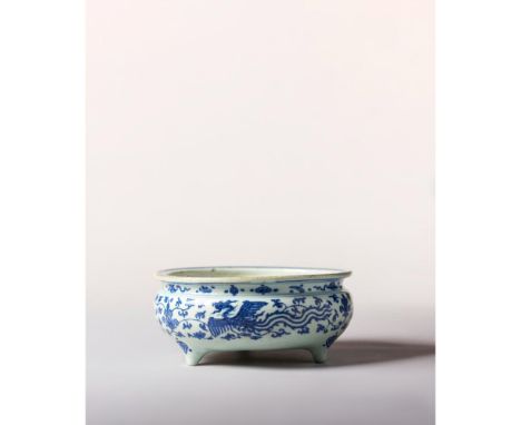 Ming/Qing Dynasty, Transitional Period, 17th century Modelled with an everted rim and painted in cobalt blue with phoenixes a