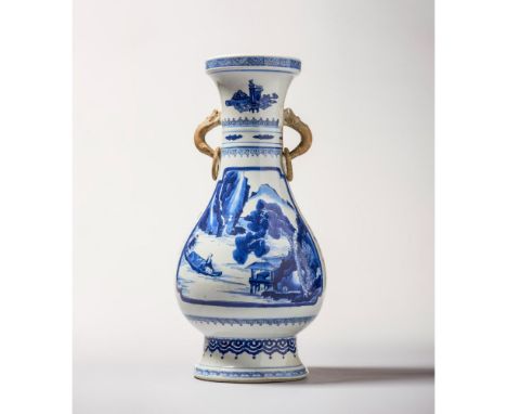 Kangxi Period (1662-1722) With two dragon loop handles, each with a loose ring, and left in the biscuit. Painted in vibrant s