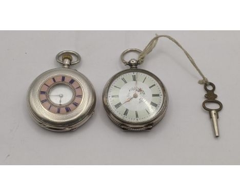 Two silver ladies pocket watches to include an open faced example with floral design to the dial with Roman numerals, with ke