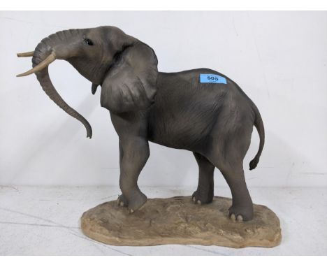 A ceramic resin sculpture of a Bull Elephant by North Light studio limited edition 255/350 with certificate of authenticity, 