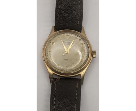 9ct yellow gold cased gents Rotary wrist watch on a brown leather strap., total weight 37.7gLocation:If there is no condition