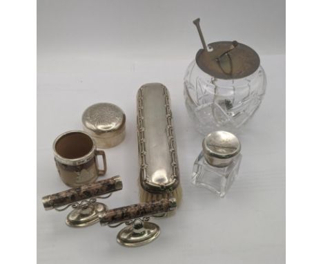 Mixed silver items to include a pair of marble cutlery rests,  silver lidded preserves pot and spoon, a dressing table brush,