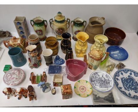 A mixed lot of mostly ceramics to include two cottage wear novelty teapots, A Royal Copenhagen 1983 Christmas plate, a Wade B