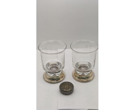 A mixed lot to include a silver pill box with a chest marked to the lid along with a pair of glass and silver weighted base t