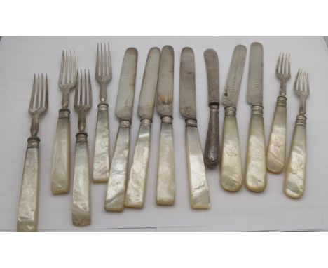 A mixed cutlery to include two silver and mother of pearl forks and knives along with a set of four silver plated and mother 