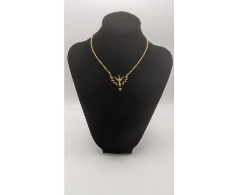 A 9ct yellow gold and seed pearl swallow pendant, on a 9ct rope twist necklace, 5.3gLocation:If there is no condition report 