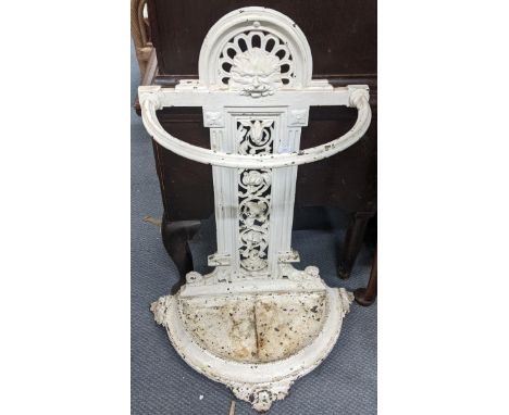 A Victorian cast iron white painted stick stand having a pierced floral back with drip tray belowLocation: A2BIf there is no 