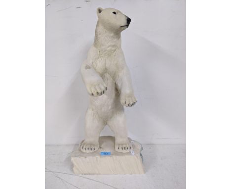 A ceramic resin sculpture of a Polar Bear by North Light Studio limited edition 16/1000 with certificate of authenticity, 61c