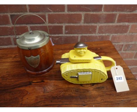 OAK BISCUIT BARREL WITH ENGRAVED ROYAL WARWICKSHIRE REGIMENT EMBLEM AND A CONTEMPORARY LEMON YELLOW AND LUSTRE CERAMIC NOVELT