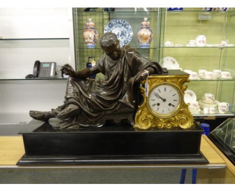 19TH CENTURY FRENCH GILT METAL AND MARBLE MANTEL CLOCK WITH PATINATED SPELTER FIGURE OF A RECLINING ROMAN SENATOR 