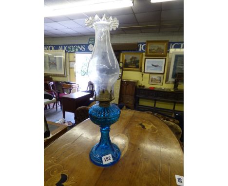 20TH CENTURY PRESSED/ MOULDED BLUE GLASS OIL LAMP WITH CRIMPED EDGE CLEAR GLASS FUNNEL 42CM 