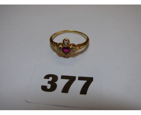 UNMARKED YELLOW METAL DIAMOND AND RUBY CROSS SET RING SIZE R 2.7G APPROX