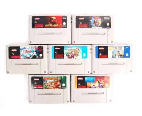 A collection of 7x Snes Super Nintendo Entertainment System computer console video game cartridges to include; Super Mario Ka