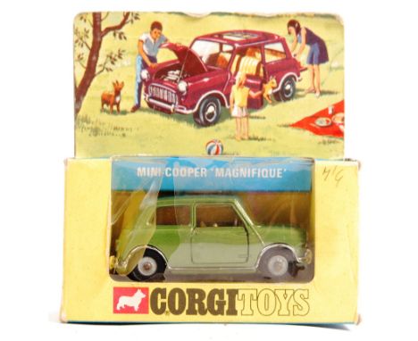 An original vintage Corgi Toys made boxed diecast model No. 334 ' Mini Cooper Magnifique '. Green, with yellow and red sunshi