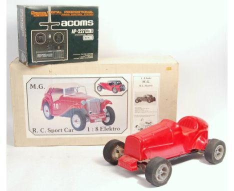 A rare vintage 1970's Yu-Can made 1/8 scale Radio Controlled&nbsp; Sports Car. Made In Holland. Fitted with full Acoms radio 