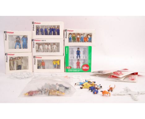 A collection of assorted miniature scale figures to include; 6x Preiser complete and incomplete sets with spares, Siku tracto