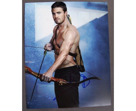 Stephen Amell - Canadian Actor - autographed 8x10" colour photograph of Amell in ' Arrow ' ( DC Comics universe). Signed acro