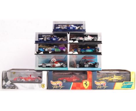A collection of 10x assorted Paul's Model Art Minichamps and Hotwheels 1/43 scale diecast model racing cars to include; Jorda