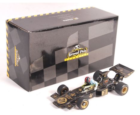 A rare Exoto made 1/18 scale precision diecast model Lotus Ford Type 72D Driver Emerson Fittipaldi 1971 rising from seat. In 