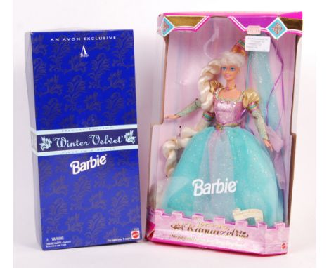 Two Mattel made Collector's Edition Barbie Dolls - Winter Velvet and Rapunzel. Both with contents mint, and unused (still tie