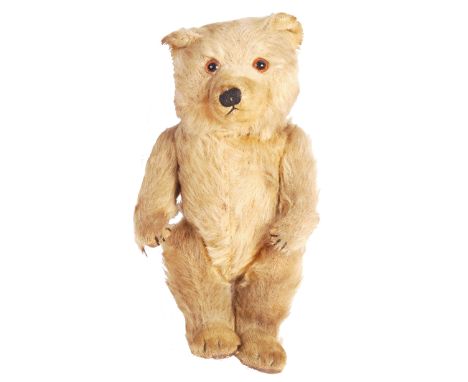 An original vintage Chiltern Toys made ' Ting A Ling ' 1950's teddy bear. Blonde mohair, with orange/black glass eyes. Chilte