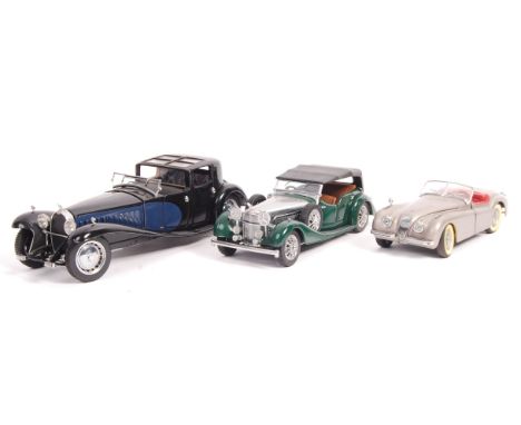 A collection of 3x Franklin Mint and Danbury Mint 1/24 precision scale diecast models. Comprising: 1930 Bugatti Royale Coupe 