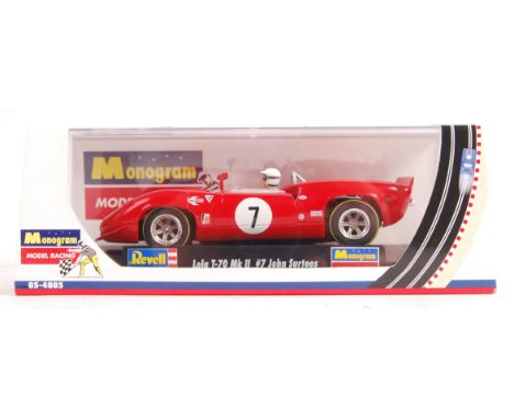 Scalextric - a Monogram Model Racing made 1/32 scale slot racing car No. 85-4885 ' Lola T-70 MkII #7 John Surtees ' in red. H