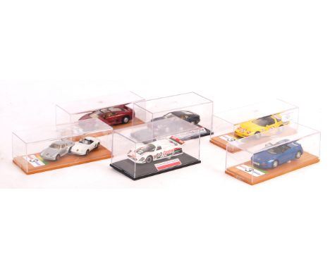 A collection of 6x assorted 1/43 scale boxed diecast models to include make by Corgi, Masito and others. All appear mint in d