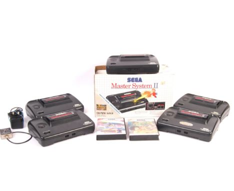 An original vintage boxed Sega Master system II video game computer console having one control pad, A/C adaptor, aerial cable