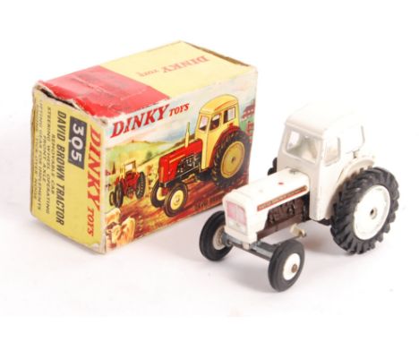 A rare original vintage Dinky Toys made boxed diecast model No. 305 ' David Brown Tractor ' White, with brown chassis and whi