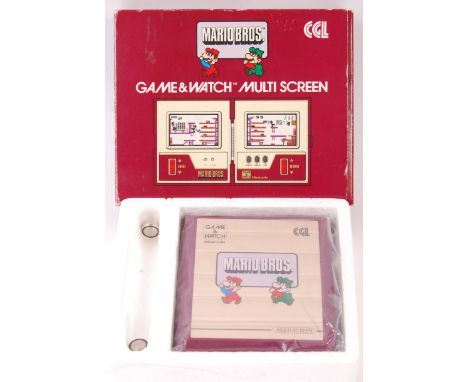 An incredible mint and unused vintage Nintendo made ' Game &amp; Watch ' ' Mario Bros ' handheld games console. The Game &amp