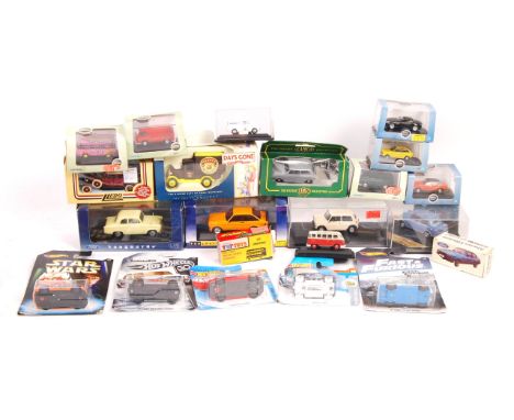 A collection of 20+ assorted scale diecast models to include Hot Wheels, Lledo, orgi, Lone Star Tuf Toys, Vanguards, Vitesse,