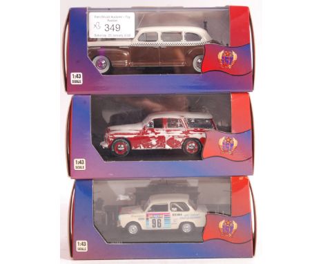 A collection of x3 IST Models made 1/43 scale precision diecast models, comprising: IST093 1948 Taxi, IST186 Snow Covered War