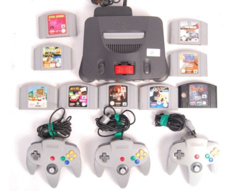 An original vintage Nintendo 64 games console, along with x3 controllers and x9 original game cartridges. Games include; V-Ra